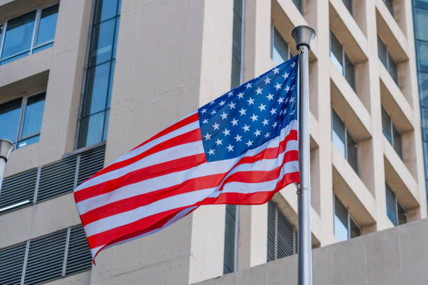 istock American flag and Modern buildings in the metropolis 2161234892