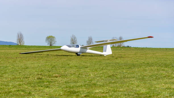 istock White glider on the grass airfield 2161235933