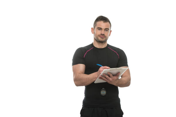 istock Personal Trainer Takes Notes On Clipboard White Background 2161242217