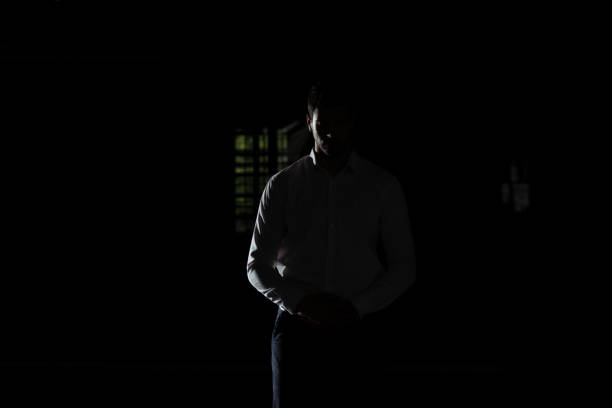 istock Muslim Man Praying In Dark Room 2161243327