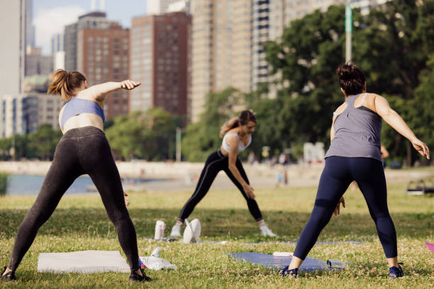 istock Yoga outdoor class in park 2161243367