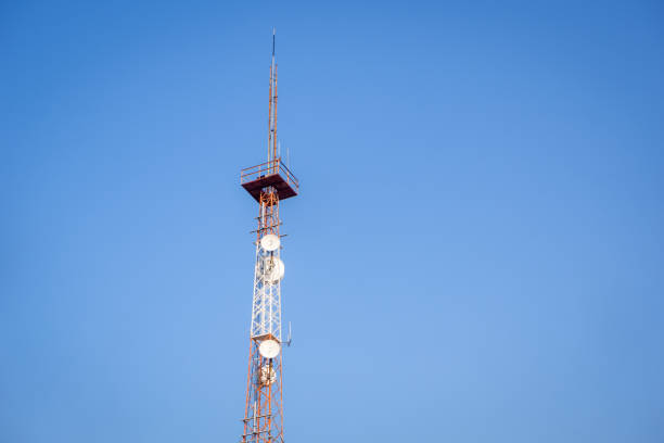 Telkomsel tower with bright blue sky background