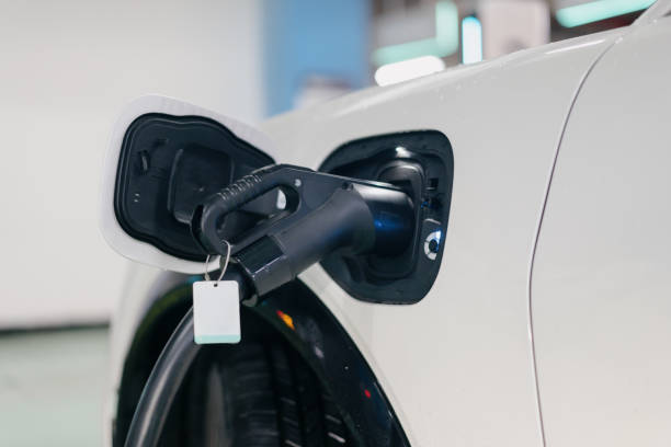 istock Electric car is charging 2161257487