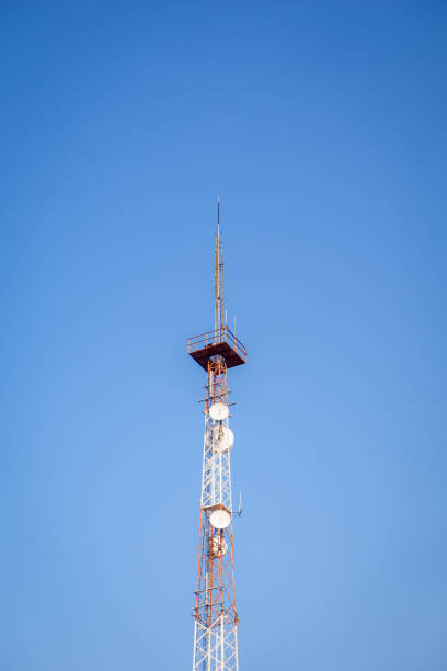istock Telkomsel tower with bright blue sky background 2161257576