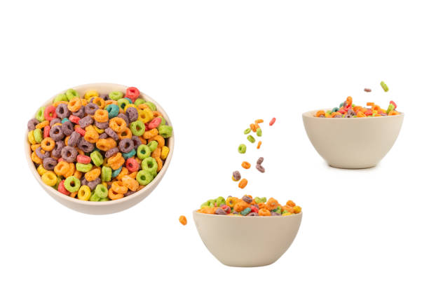 istock Colorful rings cereal spill out into a bowl. Breakfast. Isolated. 2161260449