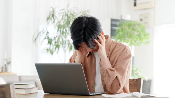 Man having trouble with computer stock photo