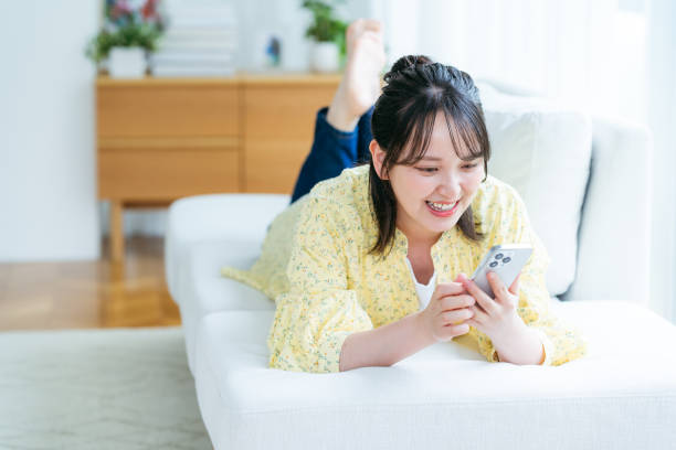 istock young woman calling on smartphone 2161277548