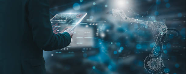 istock Industry engineer in factory,using smart tablet glass device,control automated robot arm machine learning operation,concept business and industry 4.0,Artificial intelligence or AI,with 5G network 2161277619