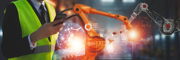 istock Industry engineer in factory,using smart tablet glass device,control automated robot arm machine learning operation,concept business and industry 4.0,Artificial intelligence or AI,with 5G network 2161277621