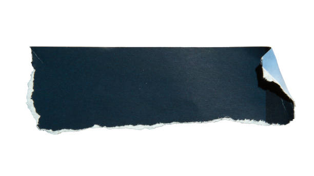Torn dark blue magazine paper