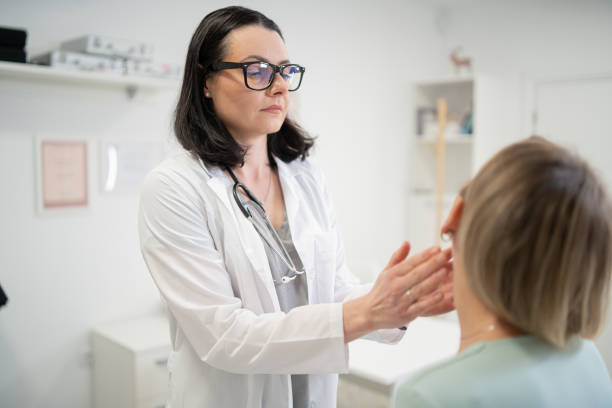 istock Doctor conducting examination with a patient 2161279842