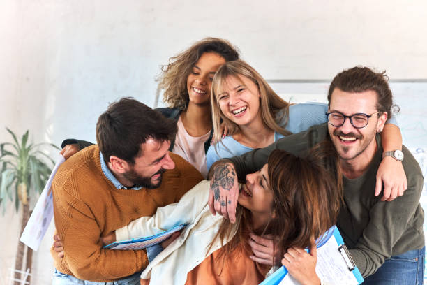 istock Cheerful creative team having fun at casual office. 2161283738