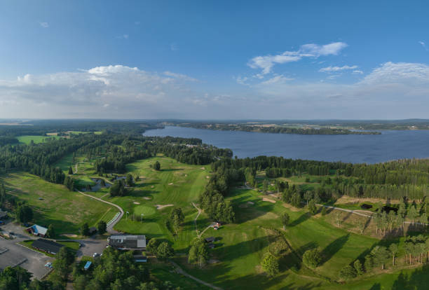 istock Summer forest landscape and blue lake 2161283992