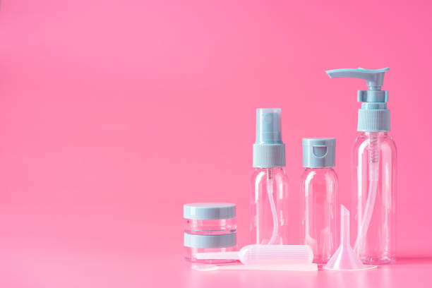 istock Empty Travel Bottles and Accessories on a Pink Background 2161286779