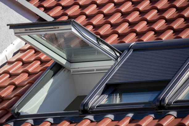 istock New roof windows with roller shutters on a red tiled roof 2161287571