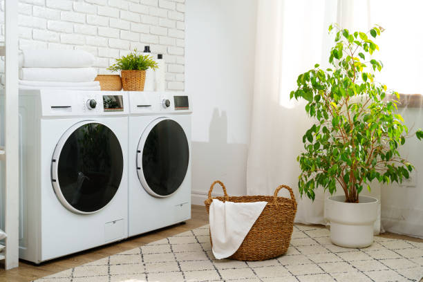istock White Washing Machines in Modern Laundry Room 2161287596
