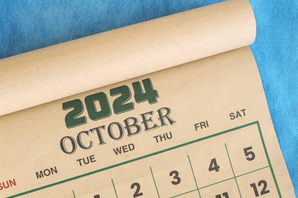 istock October 2024 calendar flat lay in blue background with copy space. 2161291455