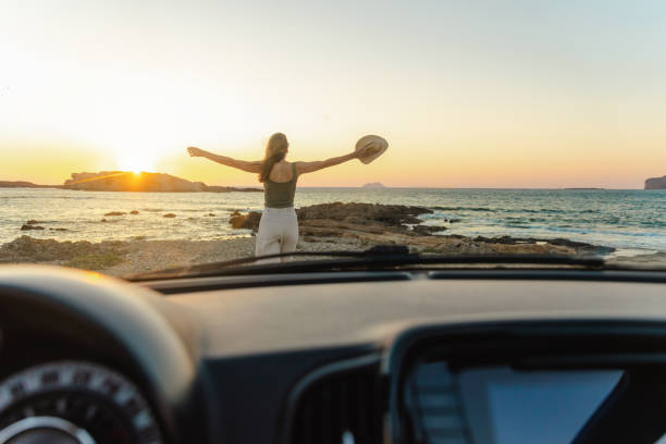 istock Enjoying sunset by the sea 2161292306