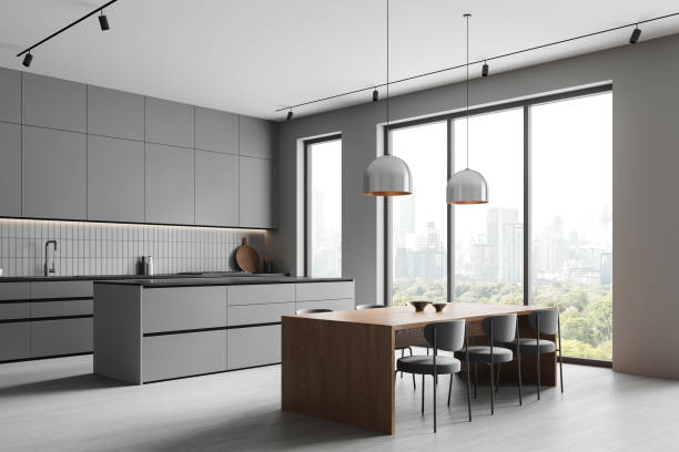 istock Modern home kitchen interior bar counter and eating space, panoramic window 2161293107