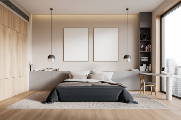 istock Stylish home bedroom interior with bed and workplace, window. Mockup frame 2161293202