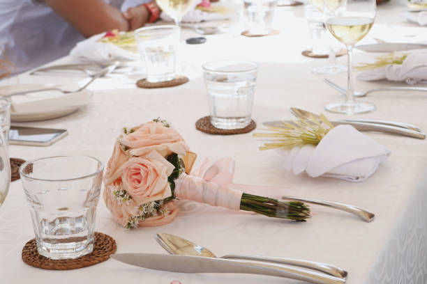 istock Rose Bouquet Flower on beautiful dining table at wedding reception 2161293214