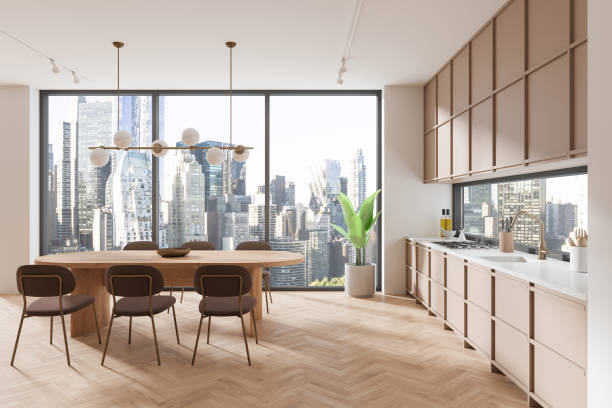 istock Modern home kitchen interior with cabinet and eating table, panoramic window 2161293236