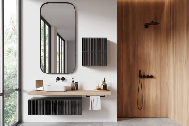 istock Minimalist hotel bathroom interior with sink and shower, panoramic window 2161293257