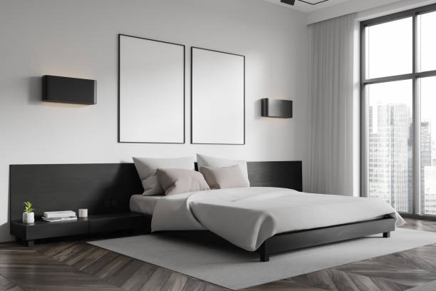 istock White home bedroom interior with bed and panoramic window. Mockup frames 2161293281
