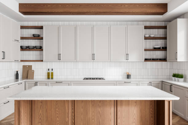 istock Modern home kitchen interior with bar island and cabinet with kitchenware 2161293420