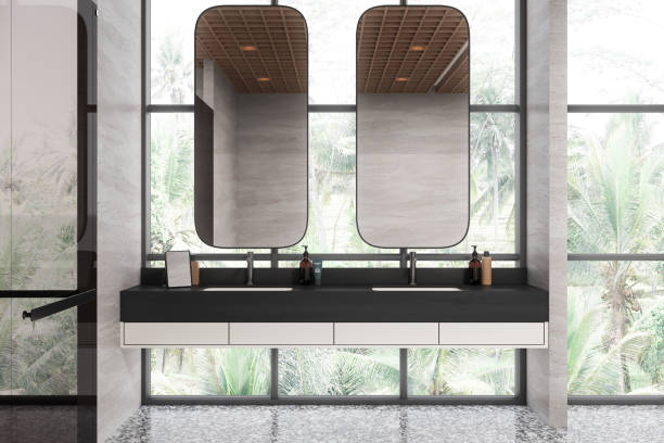 istock Modern double sink bathroom with large mirrors, light walls, and tile floor, with a window view of lush palm trees. Minimalist design. 3D Rendering 2161293851