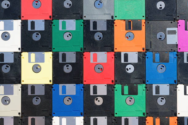 istock Vintage colored floppy disks background 2161294102