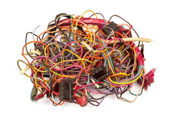 istock A lot of multi-colored wires. Tangled wiring on a white background. 2161296355