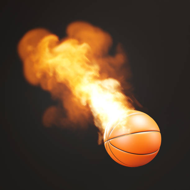 Basketball on fire on black background
