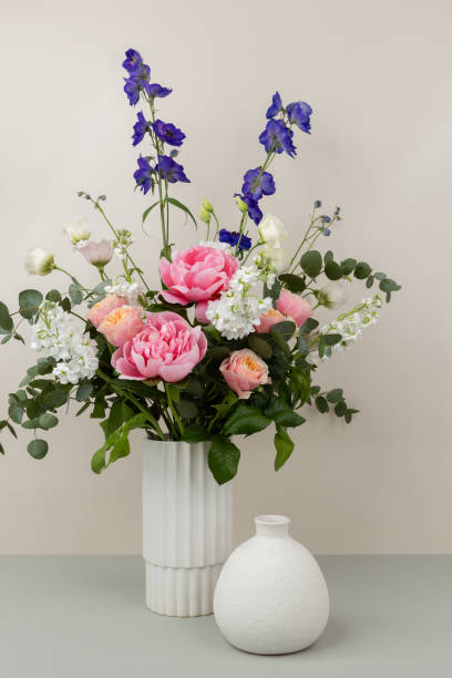 istock Wild luxury floral arrangement styled with stoneware vases 2161301757