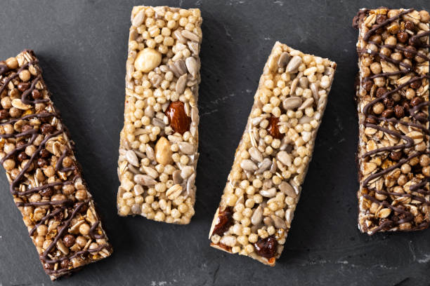 istock Muesli bar on wooden table 2161302049