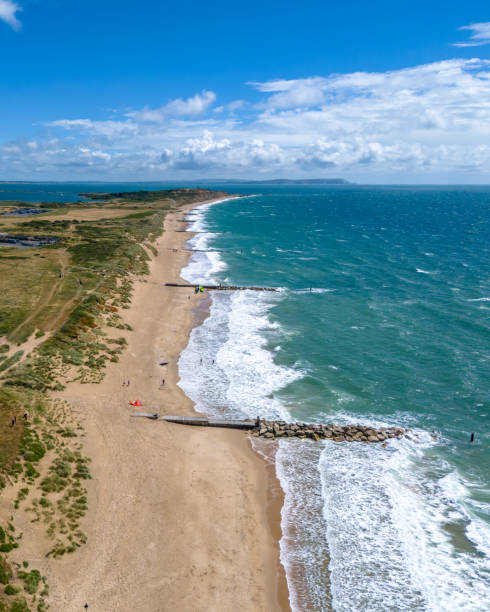 istock Sea defence groynes at Southbourne Beach 2161302204