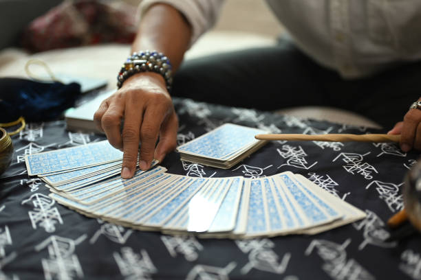 istock Closeup image of fortune teller picking tarot cards. Forecasting and divination concept 2161302467