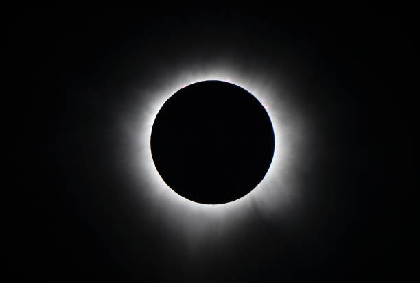 istock Solar corona and solar flare during a total eclipse photographed in Texas. 2161304360