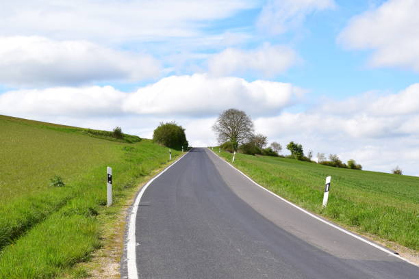 istock road with two kinds of asphalt 2161306934