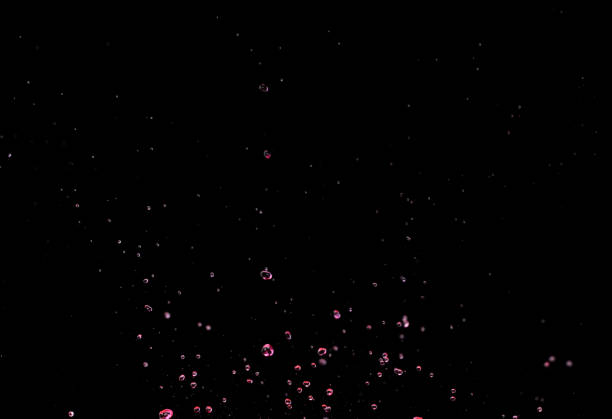 An abstract view looking up through bubbles in clear water