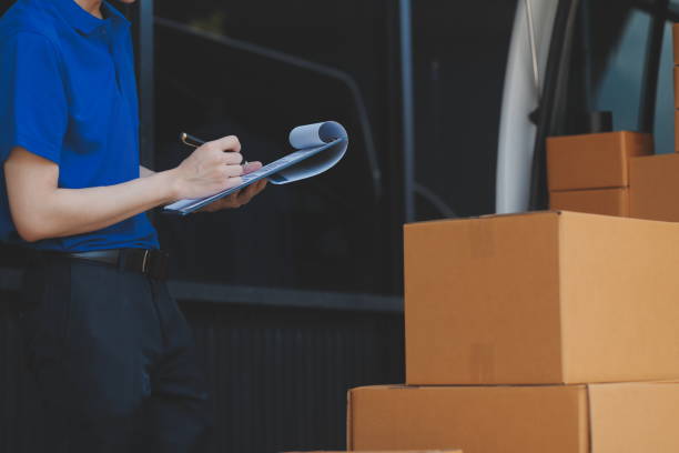istock Truck Mover Unloading Van Carrying Boxes And Moving House 2161308850