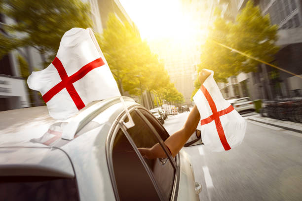 istock Fans with English Flag Celebrating in a Car 2161311447