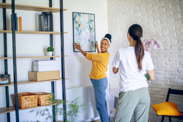 istock Couple decorating new home 2161311452