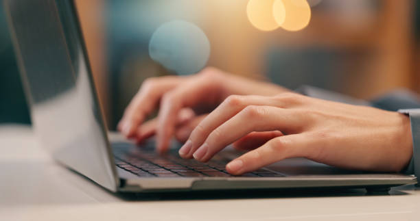 istock Person, hands and typing on laptop in office for email, spreadsheet and proposal or application for work. Woman, online and technology with bokeh for task or drafting, writing notes and report. 2161312431