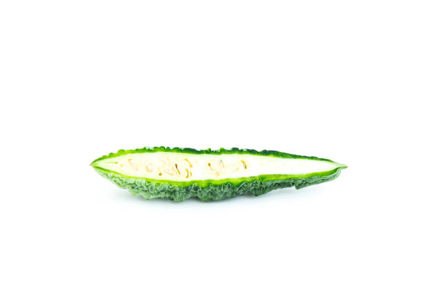 Bitter gourd fruit with cut in half isolated on white background, Organic vegetable, Herbal plant, Food ingredient