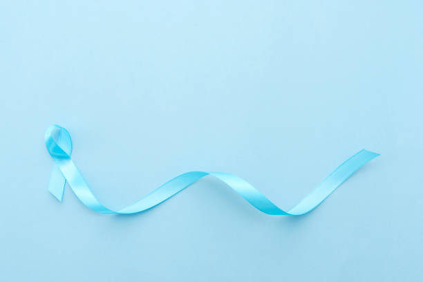 istock blue large ribbon, prostate cancer awareness blue background 2161317744