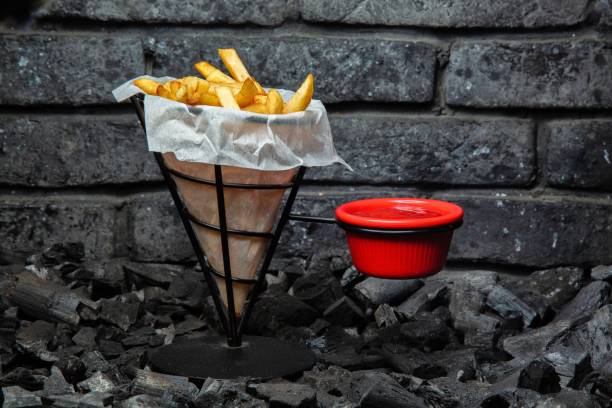 istock French Fries in Wire Basket With Red Dip 2161318657