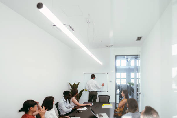 istock A man leading the meeting with his presentation 2161321597