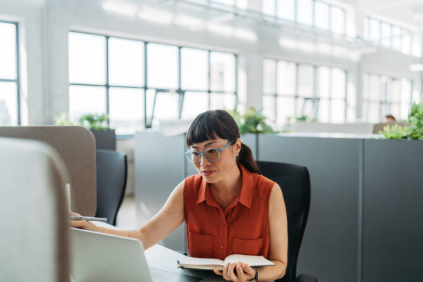 istock Asian woman's working in the co-working office space 2161321958