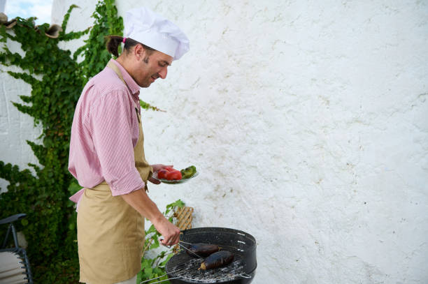 Chef grilling fresh vegetables outdoors on a sunny day. The image captures the essence of outdoor cooking and healthy eating.